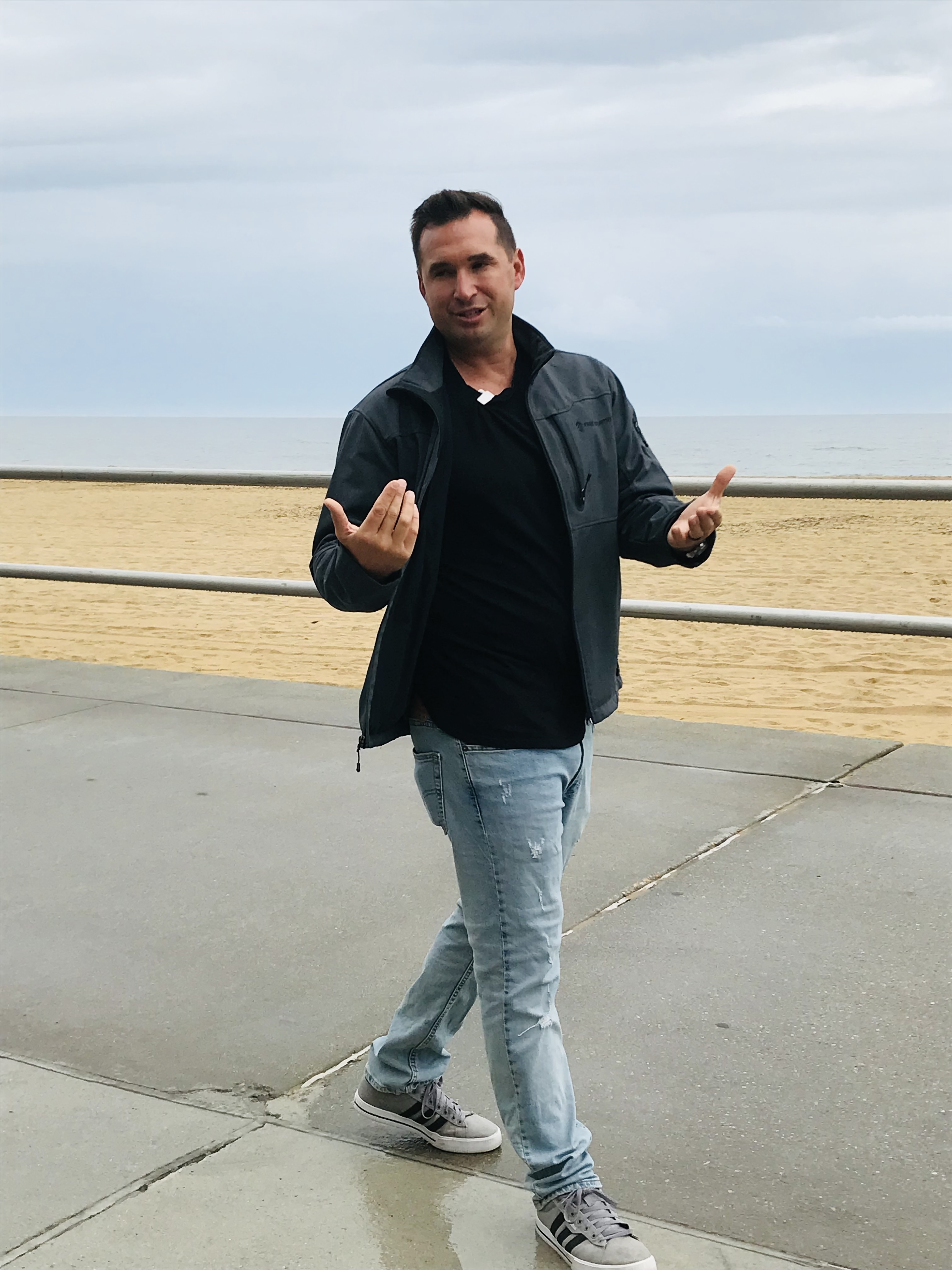 Alex Joungblood at the Virginia Beach oceanfront — founder of Solutions Home Buyers, we buy houses in Hampton Roads