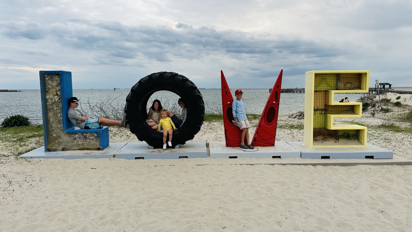 Virginia LOVE sign at Cape Charles beach — we buy houses on the Eastern Shore